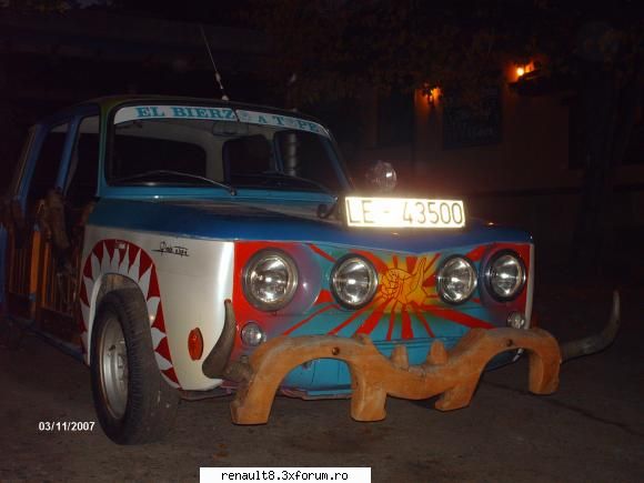 un r8, pozat in spania. e mascota unui pub. dacia 1100